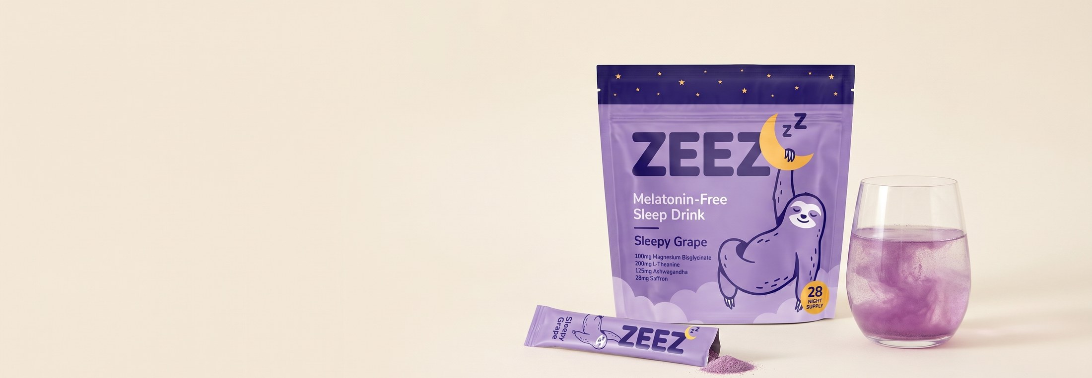 ZEEZ pouch and stick beside a glass of prepared Sleepy Grape drink